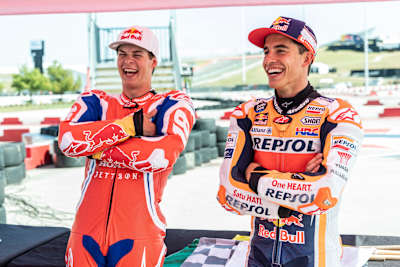 Jett Lawrence and Marc Marquez talk after they ride pit bikes in Austin