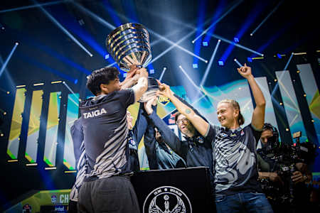 The OG Dota squad lift the trophy at the ESL One Stockholm Major 2022. 