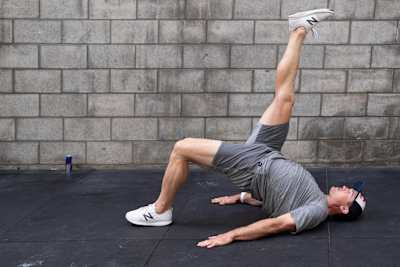 Brook Macdonald performs a sigle leg glute bridge for Red Bull Fit 2019.