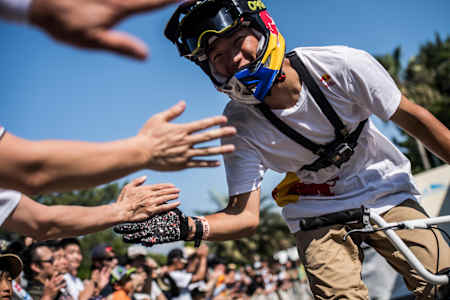 Nakamura performs as seen with fans at the Red Bull Air Race World Championship in Chiba, Japan on June 3, 2017.