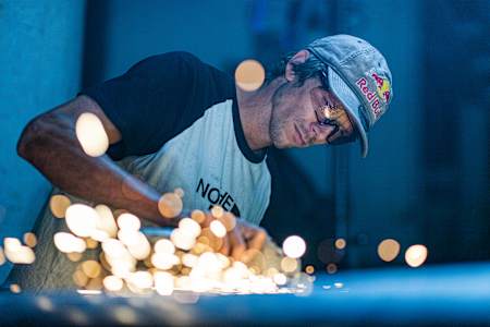 Markus Eder building the final piece of the challenge rail in Klausberg ski resort, Italy on August 20, 2020.
