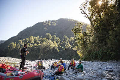 Josh James speaks at a meeting with the Rob's Wild Ride crew at a wilderness camp in the Buller District of New Zealand.