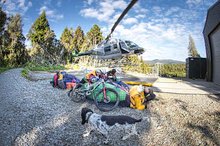 Rob Warner and Matt Jones wait to get helicoptered to a survival camp in the Buller District of New Zealand.