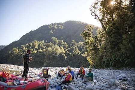 Josh James speaks at a meeting with the Rob's Wild Ride crew at a wilderness camp in the Buller District of New Zealand.