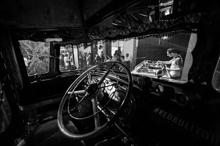 A view of the steering wheel in the Red Bull Tourbus with spectators seen outside, in Buenos Aires, Argentina on October 12, 2016.