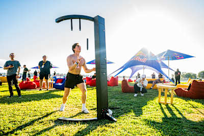 A spectator plays the reflex game at Red Bull Creator's Club, held alongside TwitchCon in San Diego, USA in October 2025. 