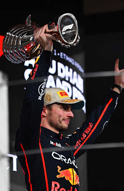 Max Verstappen of the Netherlands and Oracle Red Bull Racing celebrates on the podium during the F1 Grand Prix of Abu Dhabi at Yas Marina Circuit on December 07, 2025.