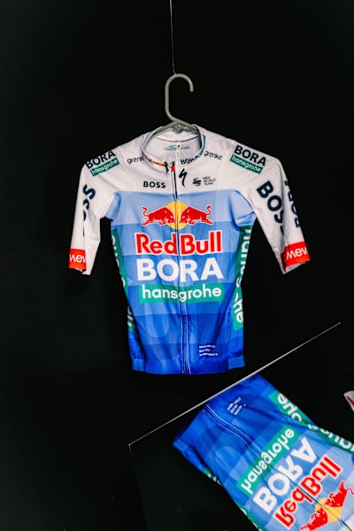 Maxim Van Gils' 2026 Red Bull - BORA - hansgrohe Tour de France jersey on a black background.