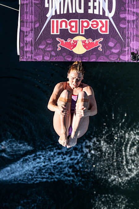 In 2025, Molly Carlson of Canada executes a spectacular dive from the 21 metre platform atop Boston's Institute of Contemporary Art at the Red Bull Cliff Diving World Series final