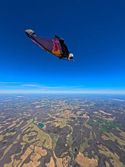 Sebastián Álvarez soaring through the air in his wingsuit