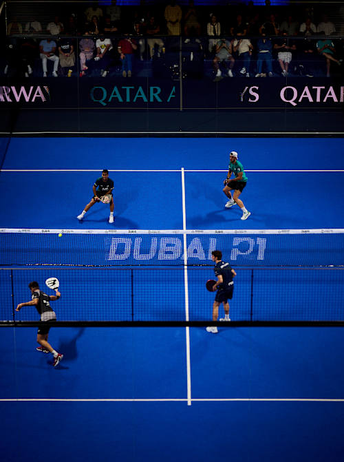 Players battle for glory at the Premier Padel P1 quarter-finals in Dubai, United Arab Emirates on November 14, 2025, as vibrant blue courts and dynamic action define Red Bull's sporting spirit