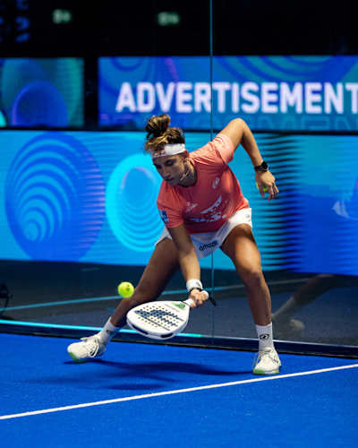 In 2024, Beatriz González returns a shot during padel semi-finals in Kuwait City