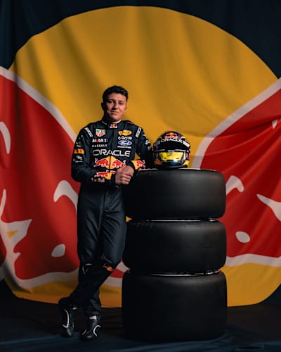 Oracle Red Bull Racing F1 driver Isack Hadjar poses with his 2026 helmet.