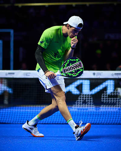 Juan Lebrón competes in the quarter-finals of Premier Padel P2 Asunción in Asunción, Paraguay, on 8 May 2026, gripping his Babolat racket on the blue court.