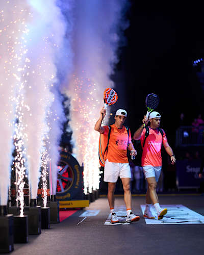 Juan Lebrón enters with Leandro Augsburger at the Qatar Airways Premier Padel Finals in Barcelona, dazzling the crowd with high-energy as pyrotechnics light up the 2025 showdown
