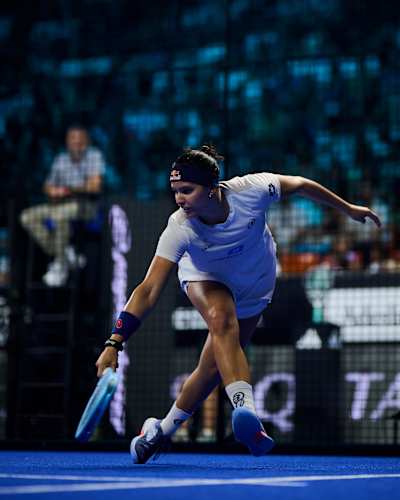In 2026, Delfina Brea delivers a shot during the Premier Padel P1 semi-finals in Valencia, Spain.