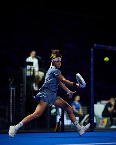 Bea González hits a forehand return during the finals of the Qatar Airways Premier Padel Finals Barcelona, Spain in 2025.