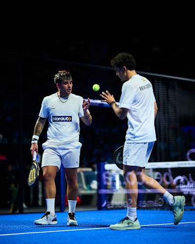 Javier Leal and Francisco Guerrero toss the ball to each other during the finals of the Premier Padel P1 Pretoria in South Africa in 2026.