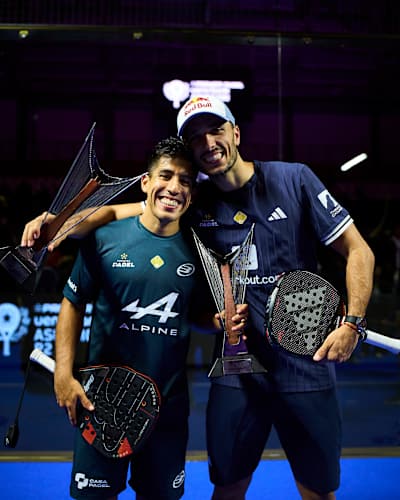 Federico Chingotto and Alejandro Galán celebrate with their winner trophies at the Premier Padel P2 Asunción in Paraguay.