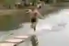 Amazing Chinese Shaolin Monk Shi Liliang during his walk on water stunt in Quanzhou, China 