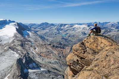 Taking a break from hiking and taking in the incredible mountain scenery in Austria.