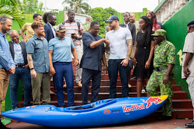 Kayaker Adrian Mattern meets representatives of Gabon's Agence Nationale des Parcs Nationaux.