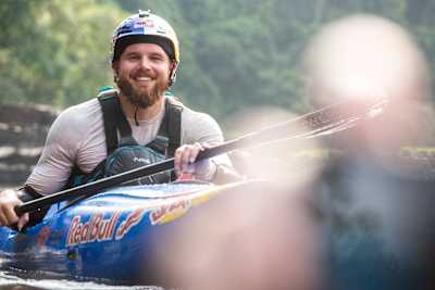 Kayaker Adrian Mattern poses for a portrait on the Ivindo River in Gabon.