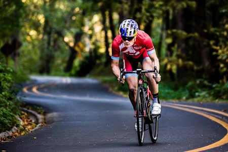 Triathlete Eric Lagerstrom powers around a corner in the Columbia River Gorge, OR, USA on 05 October 2015.