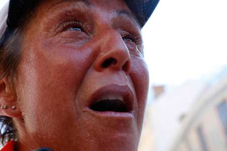 The strain of the race shows on a participant during 2015's UTMB