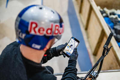 Kieran Reilly reviews a BMX clip while training at Asylum Skatepark in Nottinghamshire, United Kingdom.