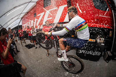 Adrien Boichis celebrates his rainbow jersey