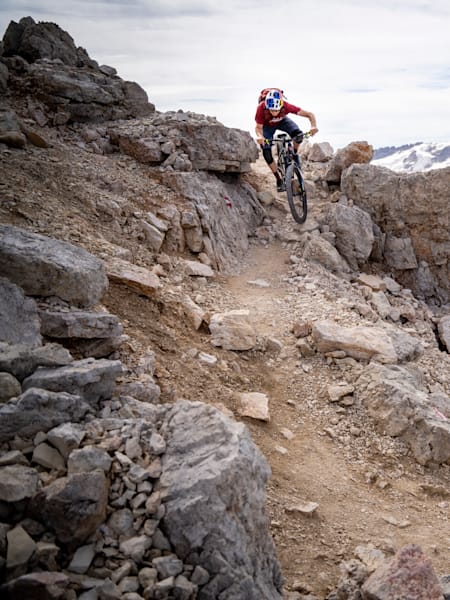 Tom Oehler descends on a trail in the Dolomites around Canazei, Italy, on August 26, 2020.