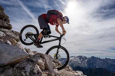 Tom Oehler goes vertical on a trail in the Dolomites around Canazei, Italy, on August 26, 2020.