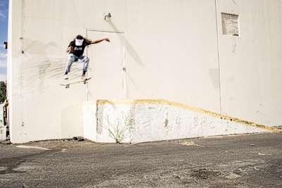 Samarria Brevard hucks a fat Kickflip off a loading dock in New Mexico.