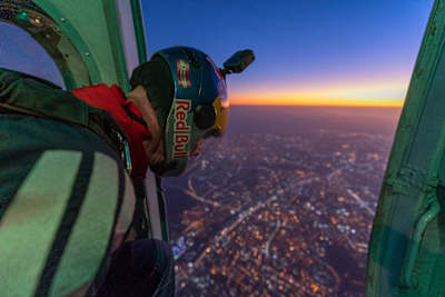 Paul Steiner looking out of helicopter hovering over national stadium