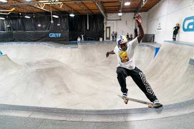 Zion Wright hits a frontside crooked grind at the Red Bull Performance Camp