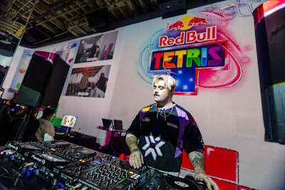 DJ Bishu performs a set at the 2025 Canadian National Final for Red Bull Tetris® in Toronto.  