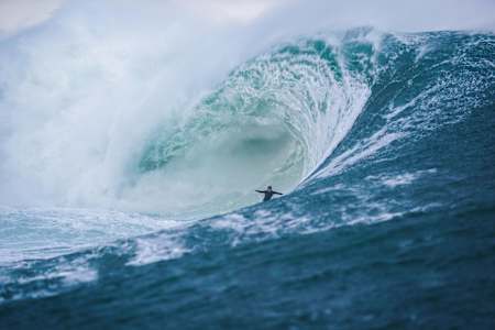 Professional big wave surfer from Ireland Conor Maguire negotiates a huge, foamy Mullaghmore wall.