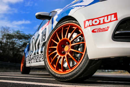 A Volkswagen car on the track