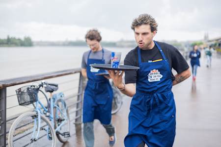 A member of the French team Tazmania takes part in the Coffee Boy race at a Red Bull Can You Make It? challenge in Bordeaux, France.