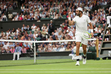 Matteo Berrettini of Italy celebrates as he plays against Jannik Sinner of Italy in his Men's Singles second round match during day three of Wimbledon 2024.