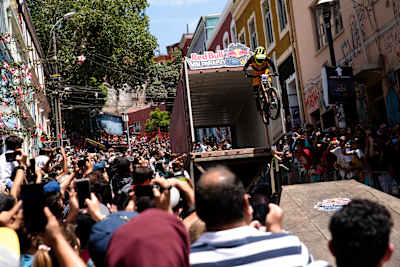 Jackson Goldstone rides through a shipping container at the 2019 Red Bull Valparaiso Cerro Abajo race in Valparaiso, Chile on February 10, 2019.