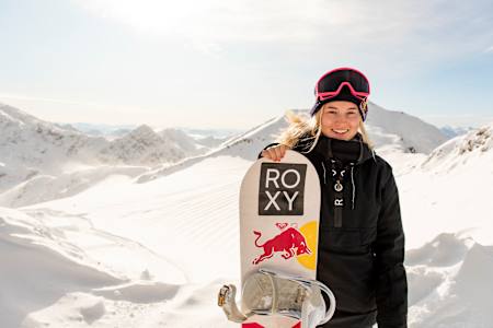 Red Bull athlete Katie Ormerod with her snowboard in Austria, 2019