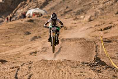 A rider participates in the dirt pump track challenge at Ladakh MTB Festival.
