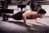 Marc Márquez, the 2018 motoGP world champion performs press ups in a training session ahead of the 2018 season.