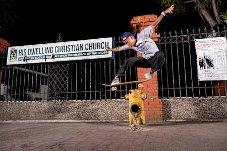 Margie Didal ollies a fire hydrant.