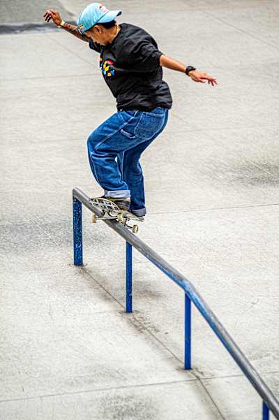 Margielyn Didal performs a frontside Smith grind 