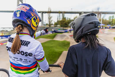 Payton Ridenour and Khothalang Leuta look over the track.