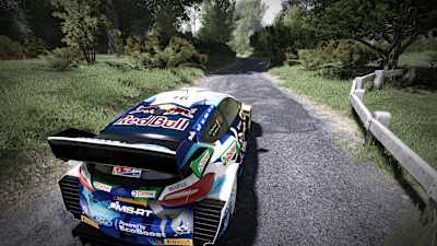 A screenshot of a Red Bull vehicle driving on a shadowy path in WRC 10.