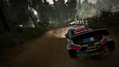 A screenshot of a Red Bull vehicle driving on country roads in WRC 10.